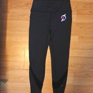 Peloton leggings with scalloped cuff.